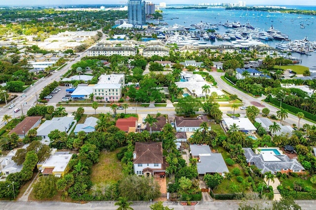 birds eye view of property featuring a water view