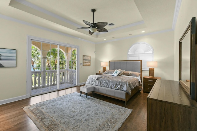 201 Avila Rd, West Palm Beach, FL 33405 - bedroom featuring a tray ceiling, access to outside, crown molding, dark wood-type flooring, and baseboards