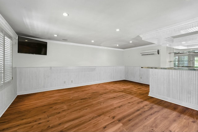 201 Avila Rd, West Palm Beach, FL 33405 - unfurnished room featuring ornamental molding, a wall mounted air conditioner, wood finished floors, wainscoting, and recessed lighting