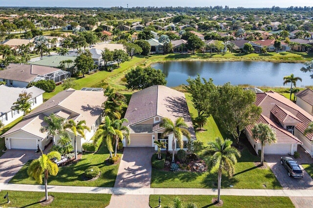 bird's eye view with a water view and a residential view