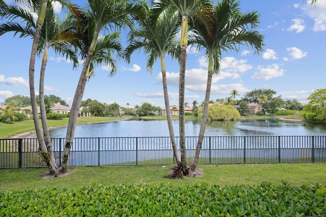view of water feature with a fenced backyard