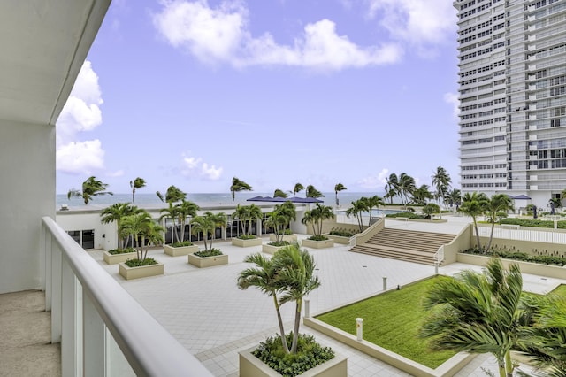 balcony featuring a water view