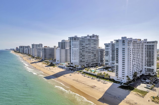 drone / aerial view of waterfront with a beach
