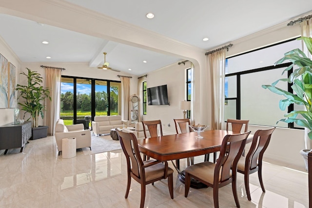 dining room featuring lofted ceiling with beams, ceiling fan, baseboards, ornamental molding, and recessed lighting