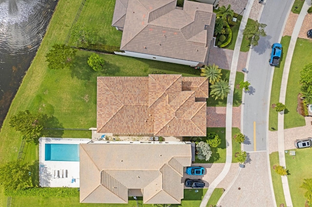 birds eye view of property featuring a water view