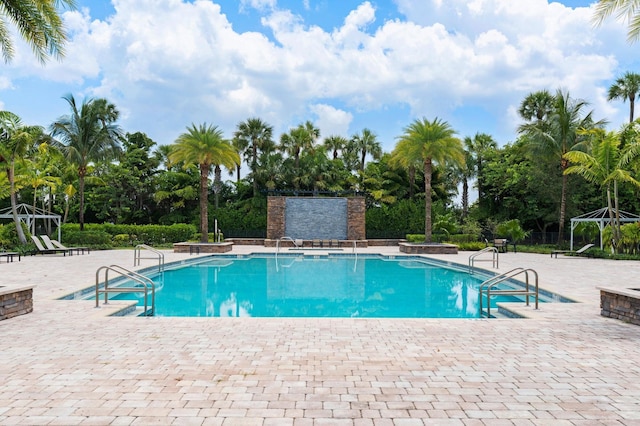 pool featuring a patio area