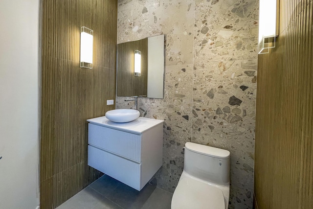 13890 Parc Dr, Palm Beach Gardens, FL 33410 - bathroom featuring vanity, toilet, and tile patterned floors