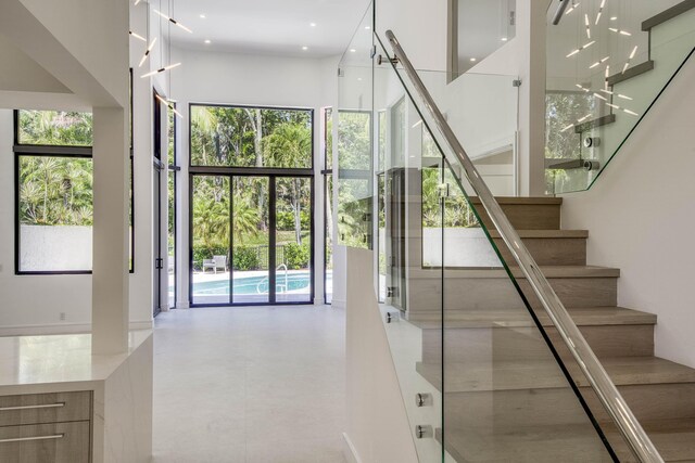 13890 Parc Dr, Palm Beach Gardens, FL 33410 - stairs with recessed lighting