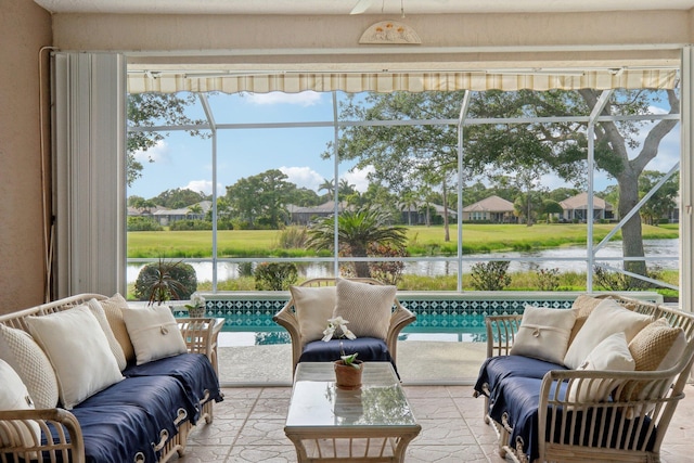 sunroom with a water view