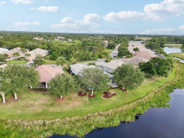 bird's eye view featuring a water view and a residential view
