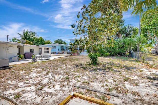 391 SW 2nd St, Boca Raton, FL 33432 - view of yard with a patio area and fence
