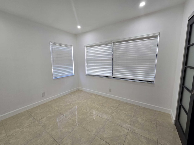 6363 Seven Springs Blvd Unit B, Greenacres, FL 33463 - tiled spare room with baseboards and recessed lighting