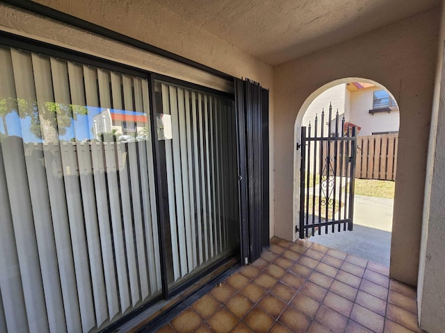 6363 Seven Springs Blvd Unit B, Greenacres, FL 33463 - exterior space featuring a gate, fence, and stucco siding