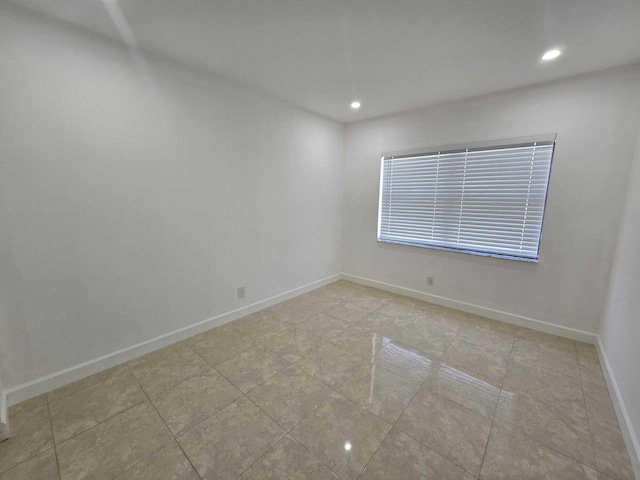 6363 Seven Springs Blvd Unit B, Greenacres, FL 33463 - spare room with recessed lighting, tile patterned flooring, and baseboards