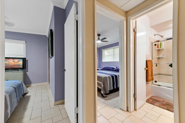 5725 Basil Dr, West Palm Beach, FL 33415 - corridor with light tile patterned floors and baseboards