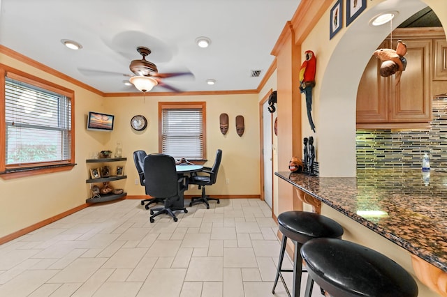 5725 Basil Dr, West Palm Beach, FL 33415 - office space with ceiling fan, baseboards, crown molding, arched walkways, and recessed lighting