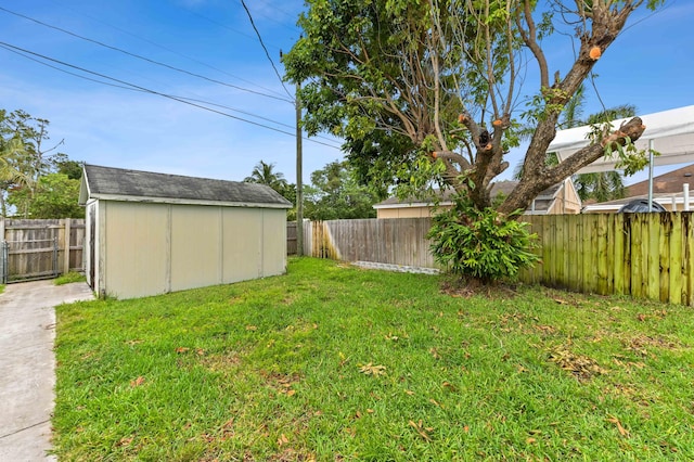 5725 Basil Dr, West Palm Beach, FL 33415 - view of yard featuring a storage shed and an outdoor structure