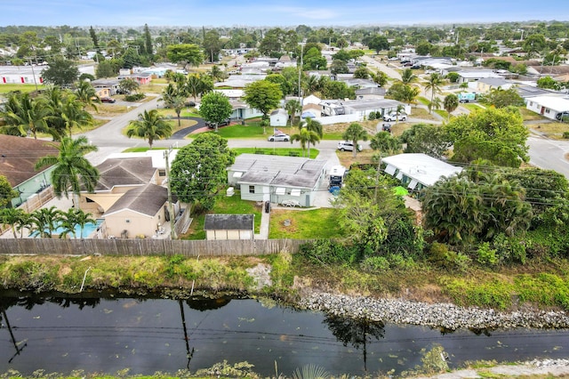 5725 Basil Dr, West Palm Beach, FL 33415 - aerial overview of property's location with nearby suburban area and a nearby body of water
