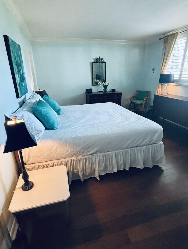 139 Sunrise Ave Unit 1050, Palm Beach, FL 33480 - bedroom with crown molding and wood finished floors