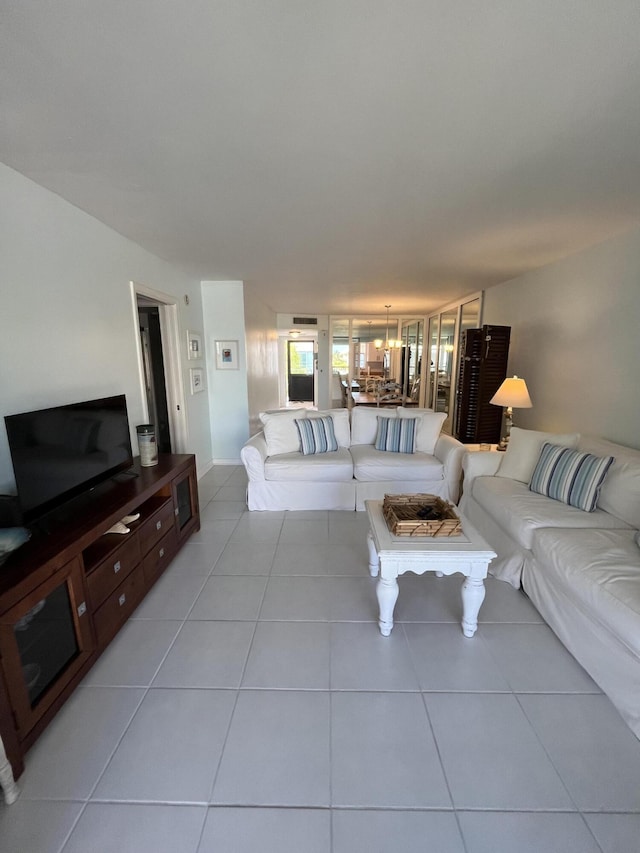 living area with light tile patterned floors
