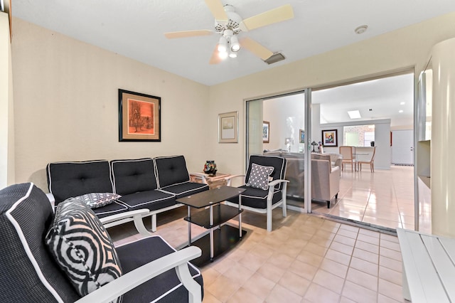 6040 Waldwick Cir, Delray Beach, FL 33484 - living area featuring tile patterned floors and a ceiling fan
