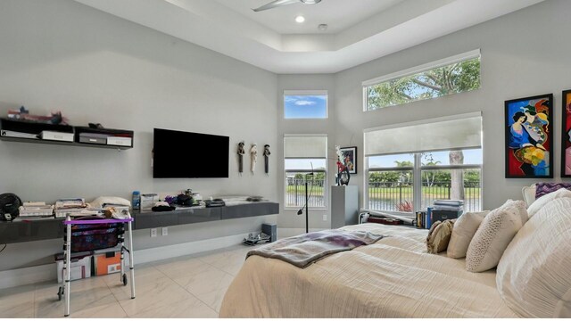 12797 Cariboo Ridge Rd, Boynton Beach, FL 33473 - bedroom with marble finish floors, a towering ceiling, baseboards, and a raised ceiling