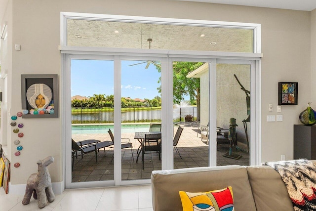 12797 Cariboo Ridge Rd, Boynton Beach, FL 33473 - doorway featuring a water view and light tile patterned floors