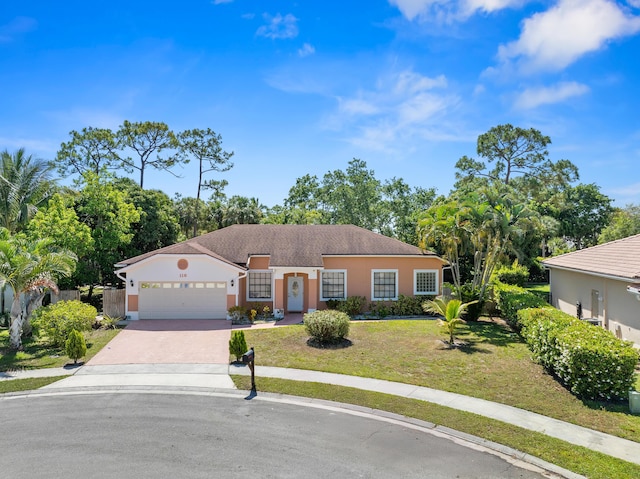 116 Churchill Dr, Royal Palm Beach, FL 33411 - ranch-style house featuring fence, stucco siding, an attached garage, driveway, and a front yard