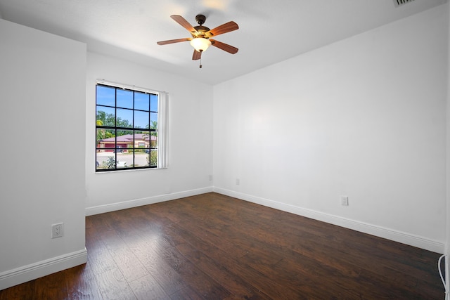 116 Churchill Dr, Royal Palm Beach, FL 33411 - spare room featuring baseboards, dark wood-type flooring, and ceiling fan