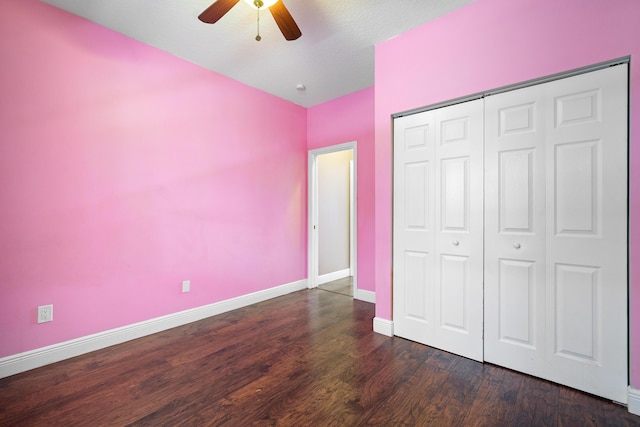 116 Churchill Dr, Royal Palm Beach, FL 33411 - unfurnished bedroom with dark wood-type flooring, a closet, a ceiling fan, and baseboards