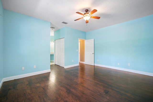 116 Churchill Dr, Royal Palm Beach, FL 33411 - unfurnished room with wood finished floors, baseboards, a ceiling fan, and visible vents