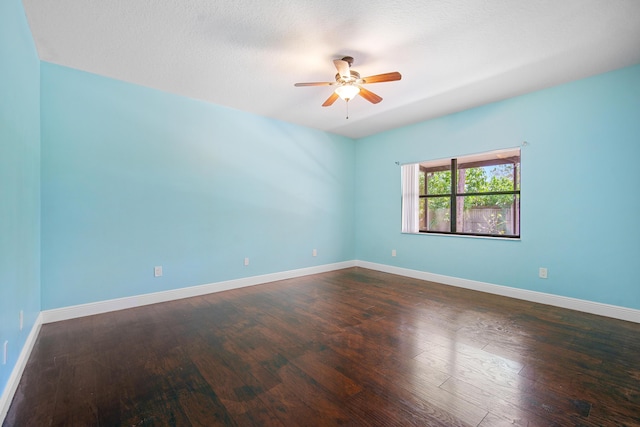 116 Churchill Dr, Royal Palm Beach, FL 33411 - unfurnished room with dark wood finished floors, baseboards, and ceiling fan