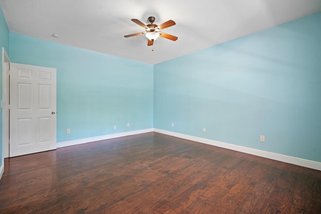 116 Churchill Dr, Royal Palm Beach, FL 33411 - unfurnished room with baseboards, a ceiling fan, and dark wood-style floors