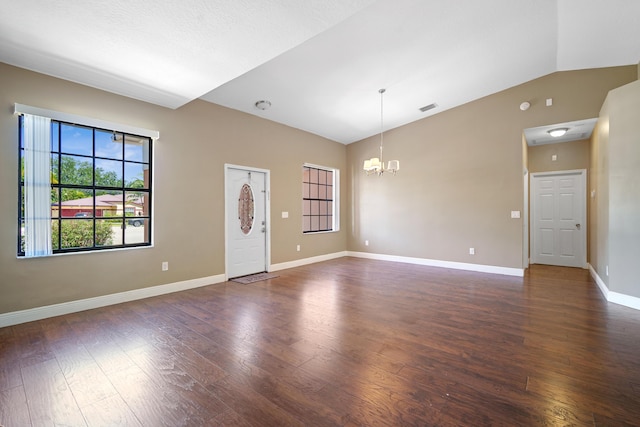 116 Churchill Dr, Royal Palm Beach, FL 33411 - interior space with dark wood-style floors, lofted ceiling, a chandelier, and visible vents