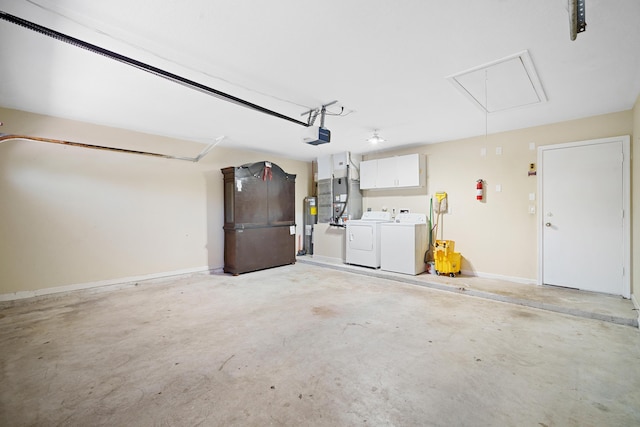116 Churchill Dr, Royal Palm Beach, FL 33411 - garage with water heater, a garage door opener, washer and clothes dryer, and baseboards