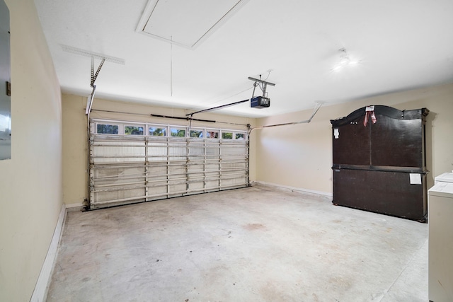 116 Churchill Dr, Royal Palm Beach, FL 33411 - garage featuring baseboards, a garage door opener, and washer / clothes dryer