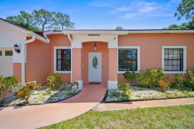 116 Churchill Dr, Royal Palm Beach, FL 33411 - property entrance featuring stucco siding