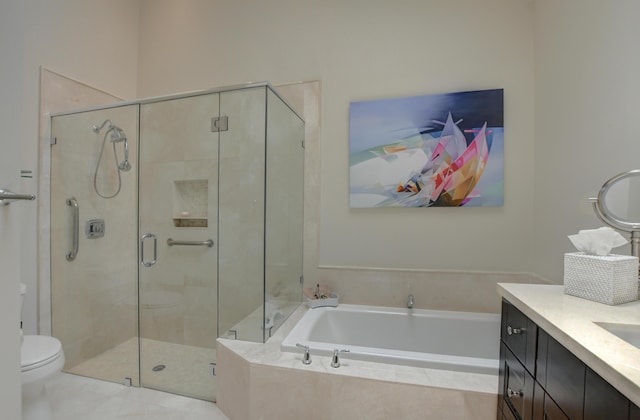 bathroom with a shower stall, toilet, a bath, and vanity