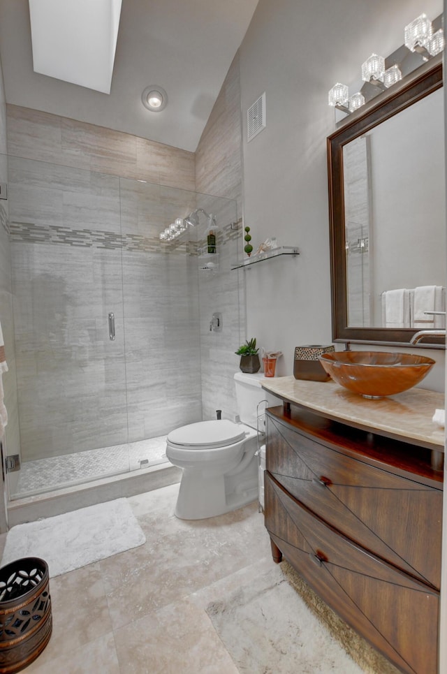 full bathroom with a stall shower, toilet, vaulted ceiling, visible vents, and vanity