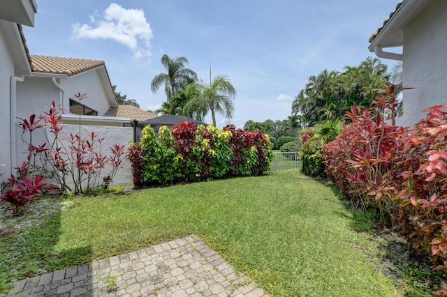 view of yard featuring fence