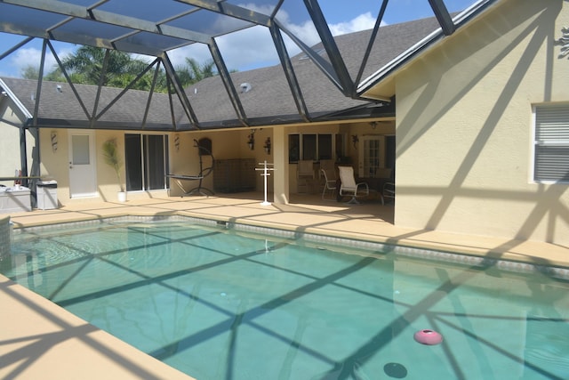 17768 Temple Blvd, Loxahatchee, FL 33470 - outdoor pool with a patio and glass enclosure
