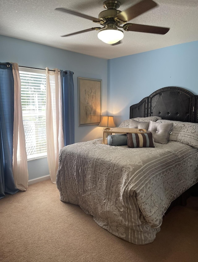 17768 Temple Blvd, Loxahatchee, FL 33470 - bedroom with carpet, a textured ceiling, and ceiling fan
