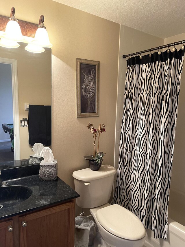 17768 Temple Blvd, Loxahatchee, FL 33470 - full bathroom featuring vanity, toilet, shower / tub combo, and a textured ceiling