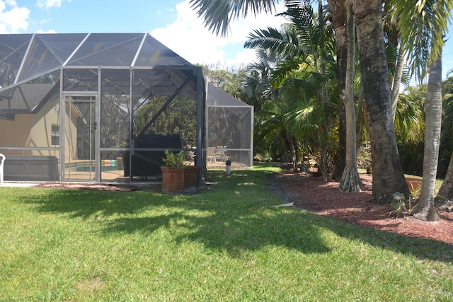 17768 Temple Blvd, Loxahatchee, FL 33470 - view of green lawn featuring a lanai and an outdoor pool