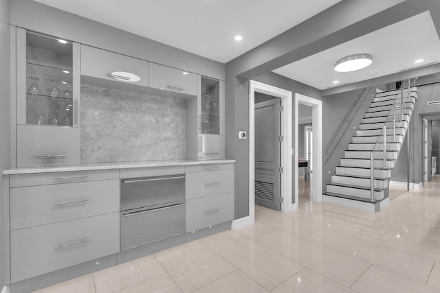 interior space featuring light tile patterned floors