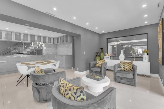 living room with recessed lighting, visible vents, baseboards, and light tile patterned flooring