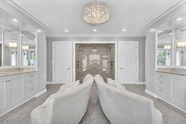 interior space with recessed lighting, ornamental molding, baseboards, and a notable chandelier