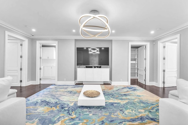 living room featuring wood finished floors, recessed lighting, and crown molding