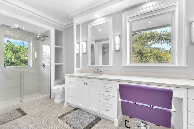 bathroom featuring a shower stall, crown molding, tile patterned floors, vanity, and toilet