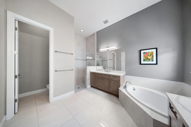 full bath featuring walk in shower, toilet, a bath, tile patterned floors, and vanity